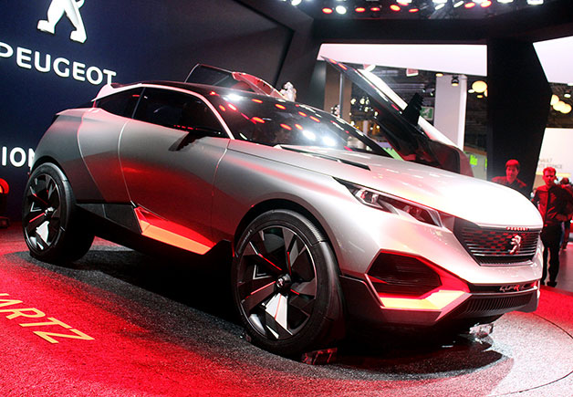 The Peugeot Quartz concept at the 2014 Paris Motor Show, front three-quarter view.